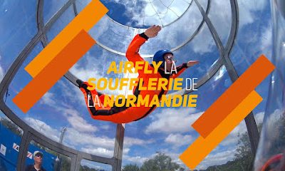 Personne en combinaison orange dans une soufflerie